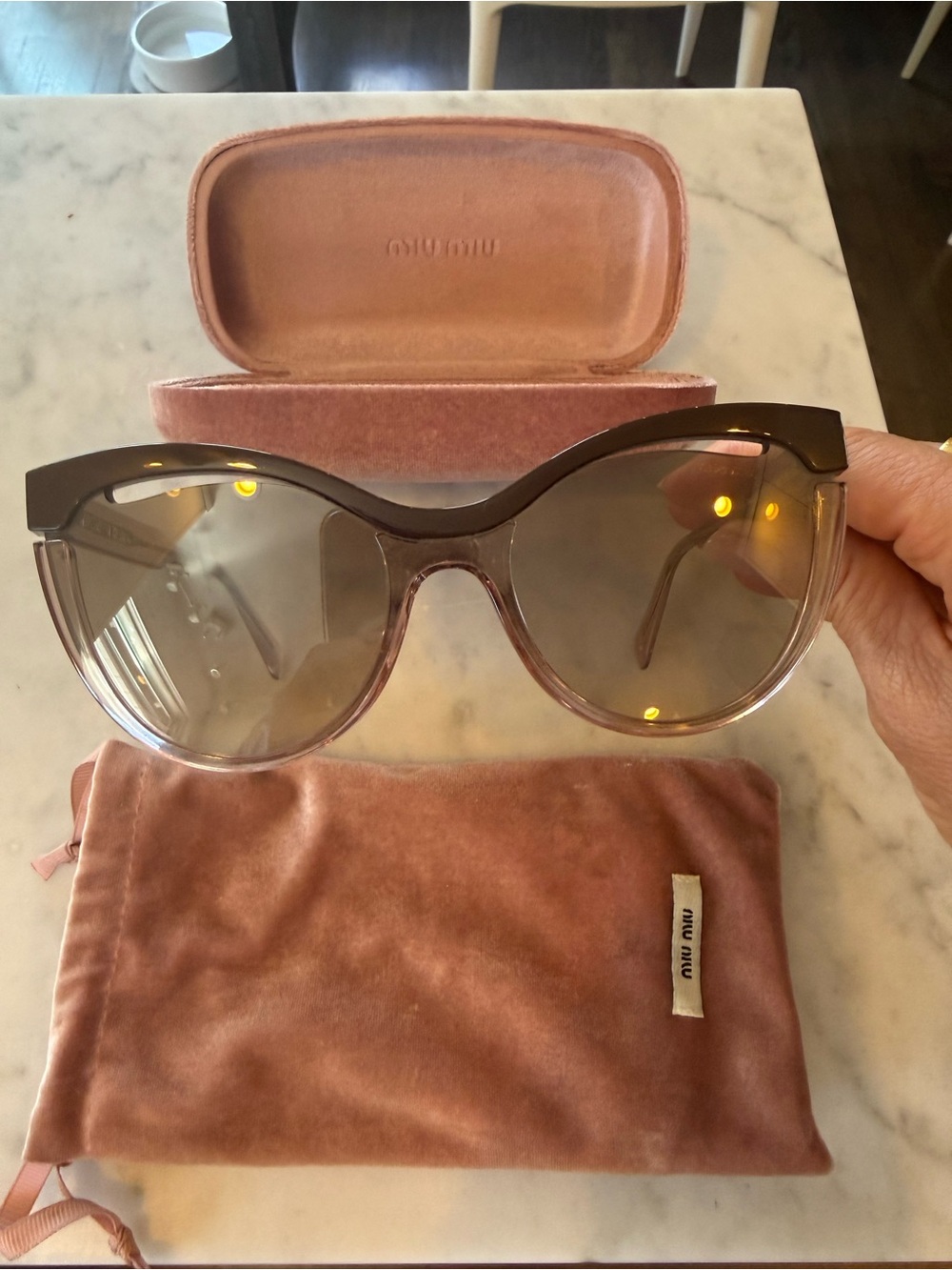 Miu Miu Cat Eye Sunglasses in Brown and Clear Pink Gradient Lense